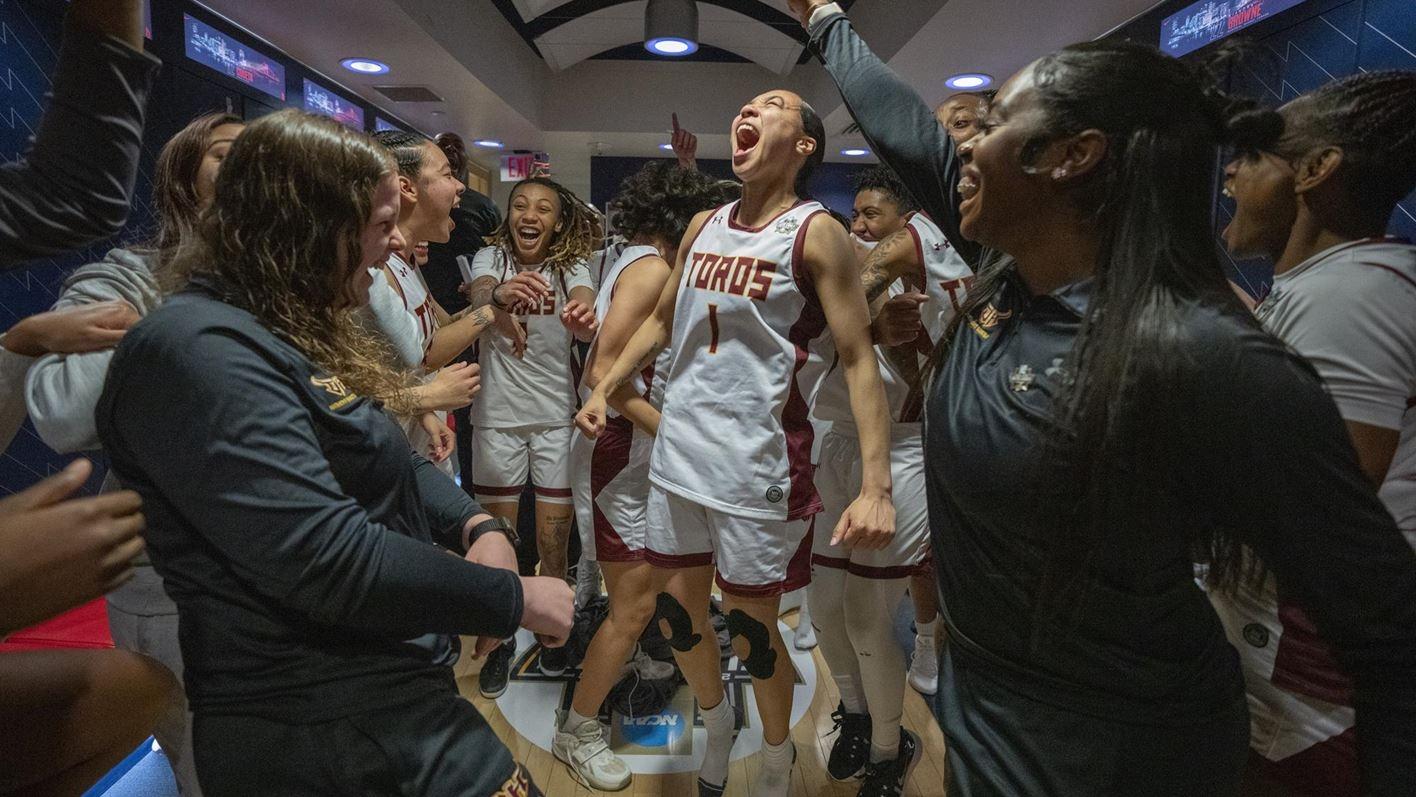 Cal State Dominguez Hills roars in locker room celebration.