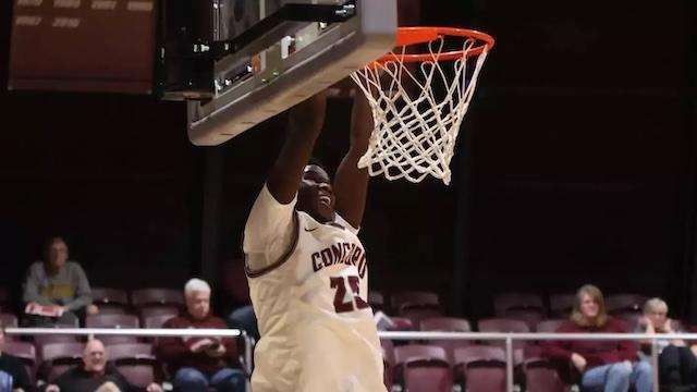 Concord basketball dunks it home. 